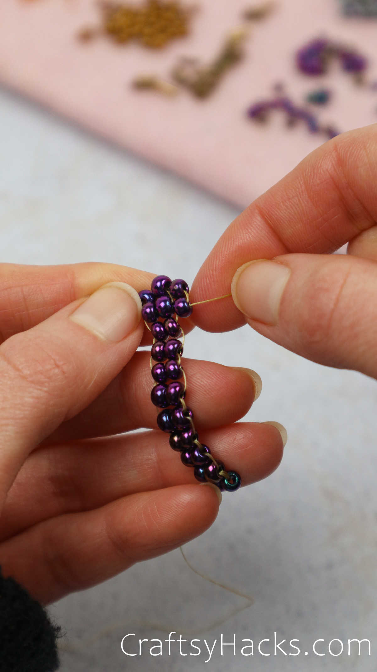 weaving beads together