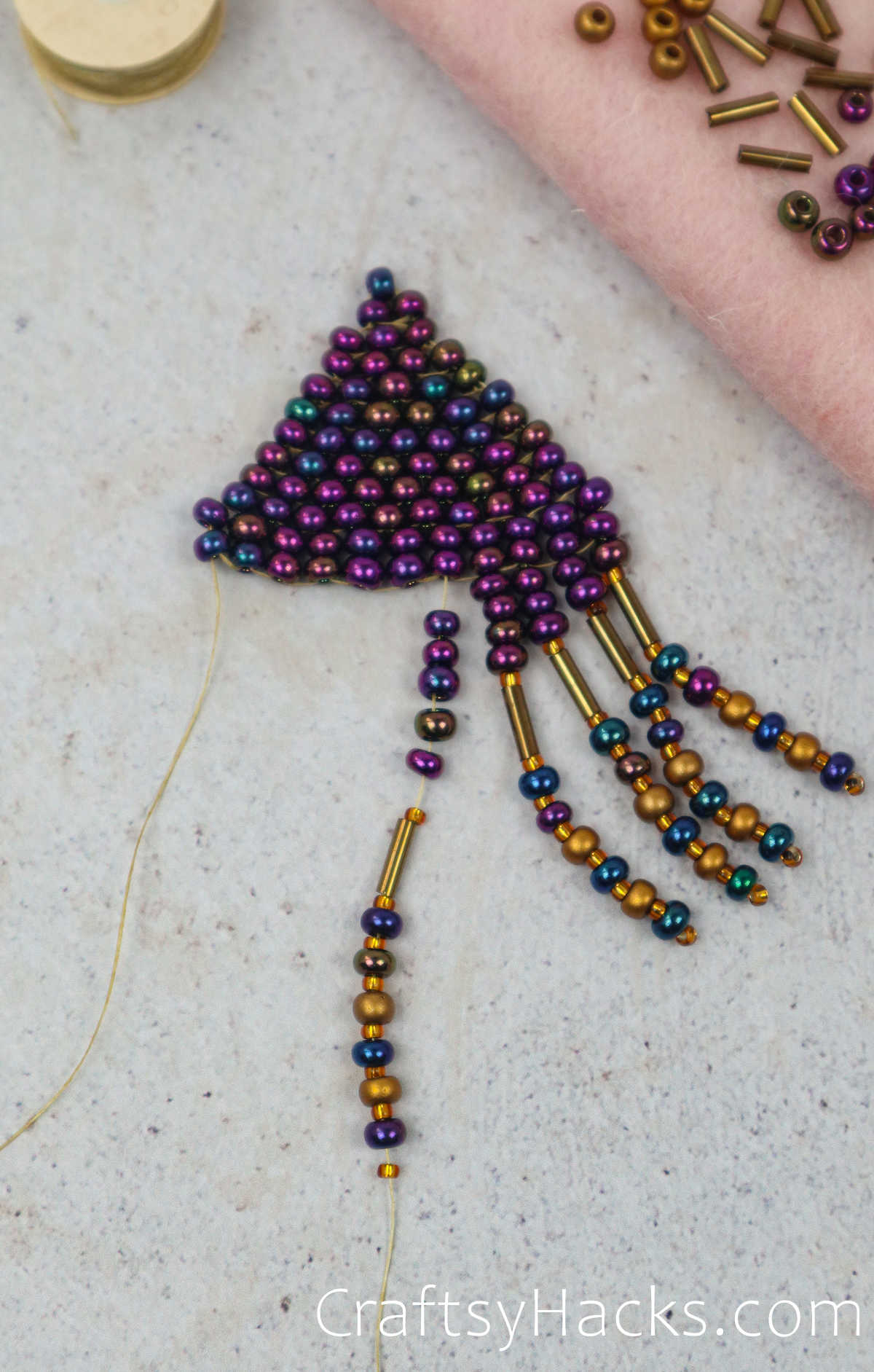 adding beads to the fringe
